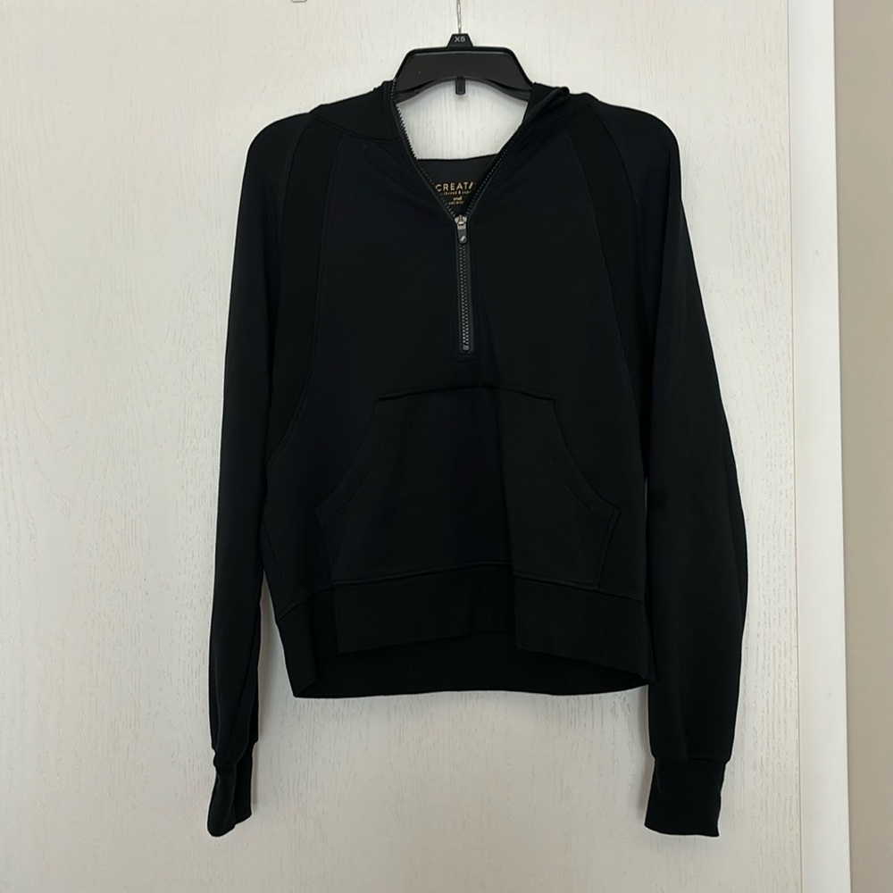 Black athletic quarter zip with hood